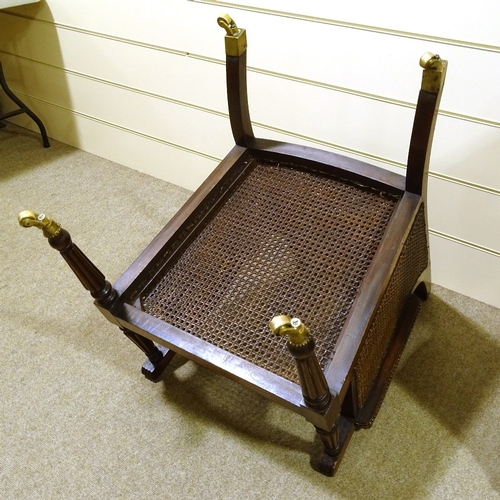 444 - A pair of 19th century Gillows style mahogany-framed bergere library chairs, with double-cane panels... 