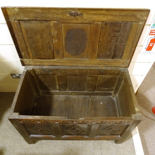 464 - 17th century panelled oak coffer, with lozenge carved 3-panel front, width 1m