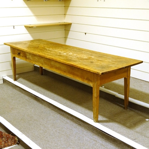 69 - A large 19th century pine farmhouse table, 3cm thick plank-top with frieze drawers and tapered legs,... 