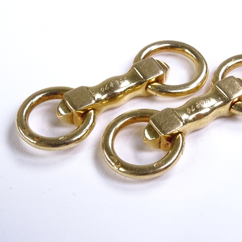 570 - CARTIER - a pair of 18ct gold snaffle horse bit pattern cufflinks, with articulated rings, both sign... 