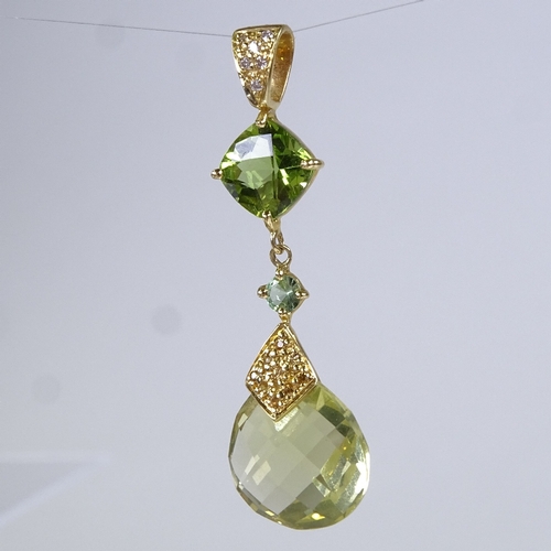 581 - A modern 18ct gold peridot diamond topaz and quartz pendant, pendant height 40.1mm, 2.9g