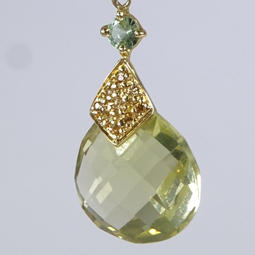 581 - A modern 18ct gold peridot diamond topaz and quartz pendant, pendant height 40.1mm, 2.9g