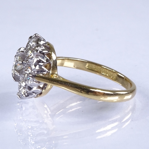 582 - A late 20th century 18ct gold diamond cluster flowerhead ring, total diamond content approx 1ct, set... 