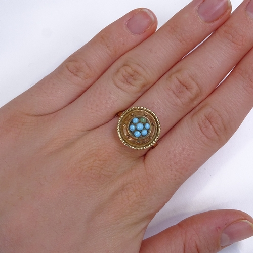 584 - A 19th century unmarked gold turquoise cluster bombe panel ring, rope twist surround with closed bac... 