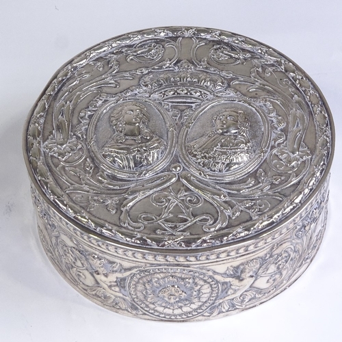 586 - An early 19th century Dutch silver circular box, hinged lid decorated with coronet and relief emboss... 