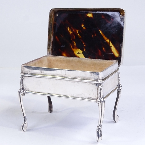 588 - An Edwardian silver tortoiseshell and gold pique inlaid dressing table jewel box, swag decoration wi... 