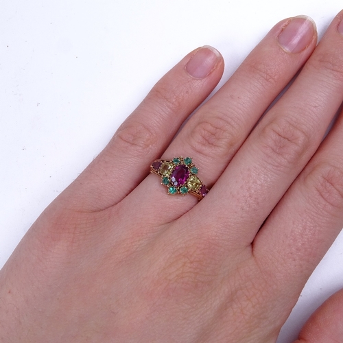 613 - A Victorian 15ct gold gem set dress ring, gem stones include garnet yellow topaz and green glass, se... 