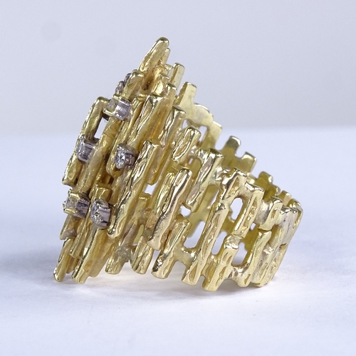 635 - A late 20th century unmarked high carat gold diamond abstract naturalistic cocktail ring, in Andrew ... 