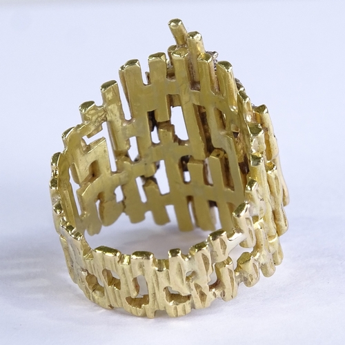 635 - A late 20th century unmarked high carat gold diamond abstract naturalistic cocktail ring, in Andrew ... 