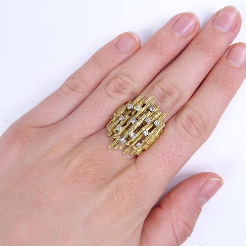 635 - A late 20th century unmarked high carat gold diamond abstract naturalistic cocktail ring, in Andrew ... 