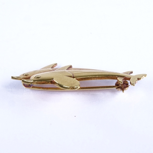 642 - GEORG JENSEN - a late 20th century Danish 18ct gold double-dolphin brooch, model no. 1317, hallmarks... 