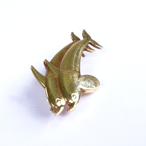 642 - GEORG JENSEN - a late 20th century Danish 18ct gold double-dolphin brooch, model no. 1317, hallmarks... 