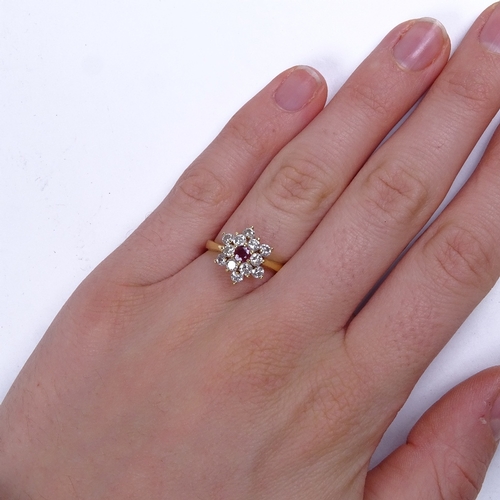 645 - A late 20th century 18ct gold ruby and diamond cluster snowflake dress ring, total diamond content a... 