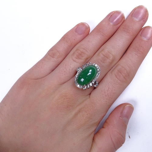 647 - An unmarked white gold cabochon jadeite and diamond cluster cocktail ring, jadeite measures: length ... 