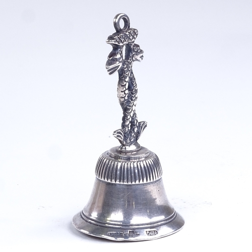 653 - An 18th century Spanish cast-silver table bell, circa 1785, entwined dragon handle stamped Biosca, h... 