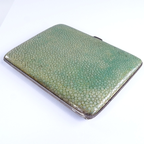 655 - A George V Art Deco silver and shagreen rectangular cigarette case, gilt interior, by Harman Brother... 