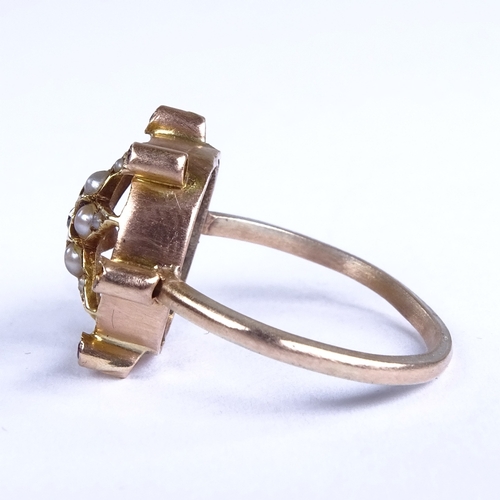 660 - An unmarked gold split pearl garnet and diamond starburst panel ring, setting height 14.1mm, size H/... 