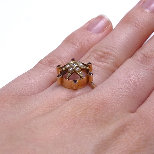 660 - An unmarked gold split pearl garnet and diamond starburst panel ring, setting height 14.1mm, size H/... 