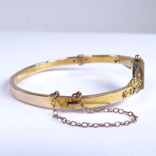 677 - A 19th century 15ct gold and diamond Etruscan hinged bangle, internal length 55mm, internal height 4... 