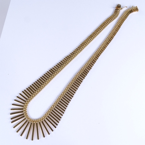 678 - A late 20th century 18ct gold graduated hollow tube link fringe necklace, with double-bead row and t... 