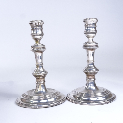 693 - A pair of Elizabeth II silver table candlesticks, by William Comyns & Sons Ltd, hallmarks London 195... 