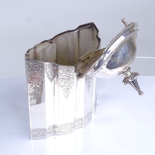 702 - A late Victorian marquise-shaped silver tea caddy, in Georgian style, bright-cut floral engraved swa... 