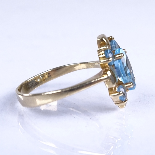 710 - A late 20th century 14ct gold blue topaz dress ring, setting height 13.7mm, size K, 2.7g