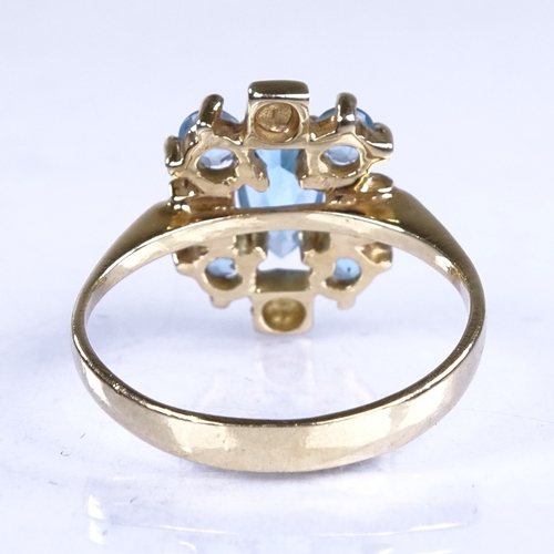 710 - A late 20th century 14ct gold blue topaz dress ring, setting height 13.7mm, size K, 2.7g