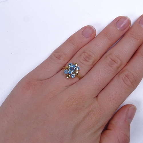 710 - A late 20th century 14ct gold blue topaz dress ring, setting height 13.7mm, size K, 2.7g