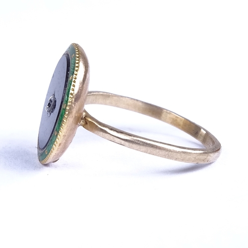 716 - An unmarked gold onyx diamond and green enamel panel dress ring, panel diameter 14.3mm, size L, 2.6g