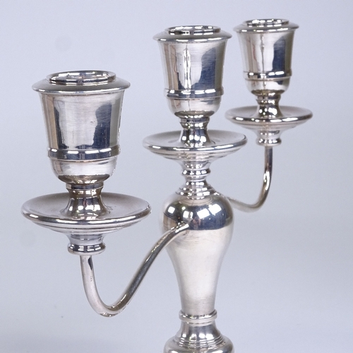 718 - An Elizabeth II silver 3-light 2-branch table candelabra, by Charles S Green & Co Ltd, hallmarks Bir... 