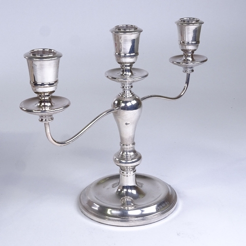 718 - An Elizabeth II silver 3-light 2-branch table candelabra, by Charles S Green & Co Ltd, hallmarks Bir... 