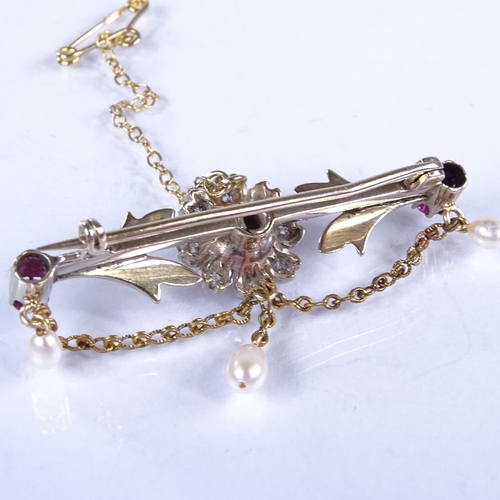 723 - A 19th century unmarked gold ruby pearl and diamond bar brooch, floral decoration with chain swags, ... 