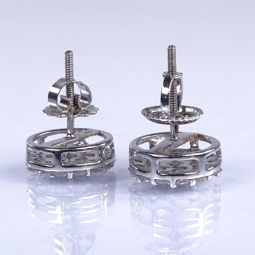 732 - A modern pair of 9ct white gold diamond cluster screw-back earrings, earring diameter 9.7mm, 2g