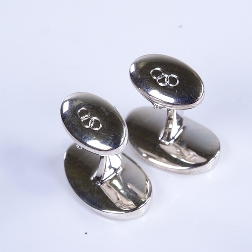 758 - LINKS OF LONDON - a modern pair of sterling silver oval panel cufflinks, panel length 19.8mm, 18.2g