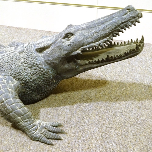 114 - A near life-size verdigris bronze crocodile, no artist's signature or foundry marks, length 213cm (7... 