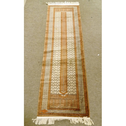 143 - A modern Persian silk runner,  235cm x 70cm.