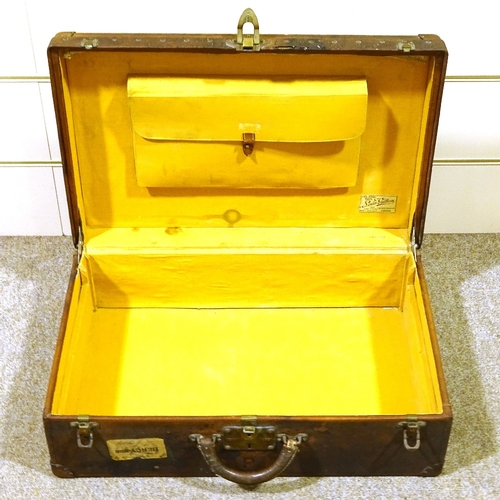 267 - LOUIS VUITTON - 19th century leather suitcase, brass locks with original label, serial no. 168458, 6... 