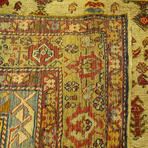 304 - A Persian handwoven geometric design rug