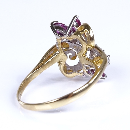 762 - A late 20th century 18ct gold ruby and diamond floral dress ring, total diamond content approx 0.25c... 