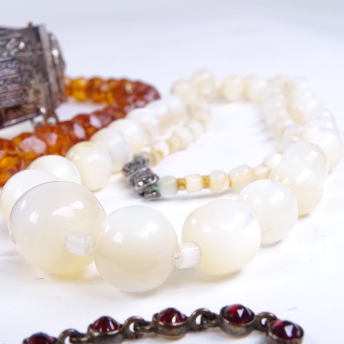 767 - Various jewellery, including butterfly wing pendant and bracelet, faceted amber bead necklace, garne... 