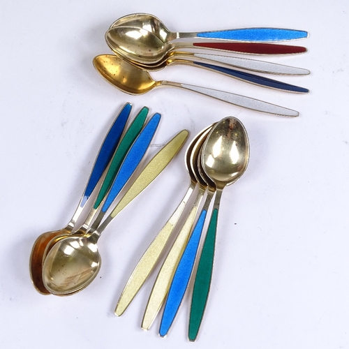 768 - GEORG JENSEN - a Vintage set of 13 Danish sterling silver-gilt harlequin coloured enamel coffee spoo... 