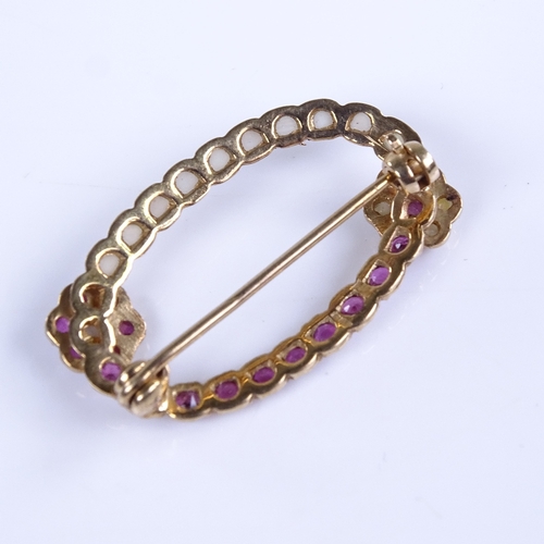 770 - A late 20th century 9ct gold ruby and split pearl floral oval brooch, brooch length 31.2mm, 3.1g