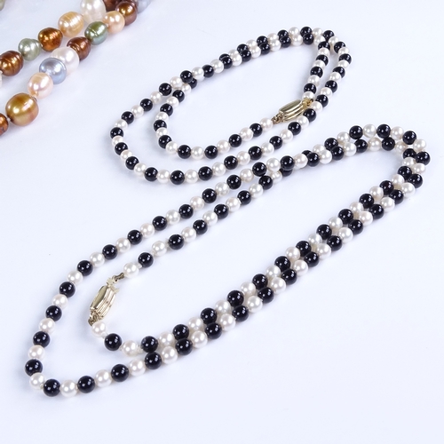 776 - A graduated pair of onyx and cultured pearl bead necklaces with 9ct gold clasps, and a multi-colour ... 