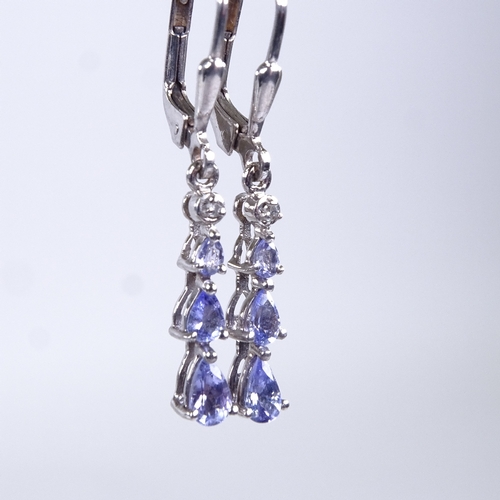 783 - A modern pair of sterling silver pear-cut tanzanite and diamond pendant earrings, earring height exc... 