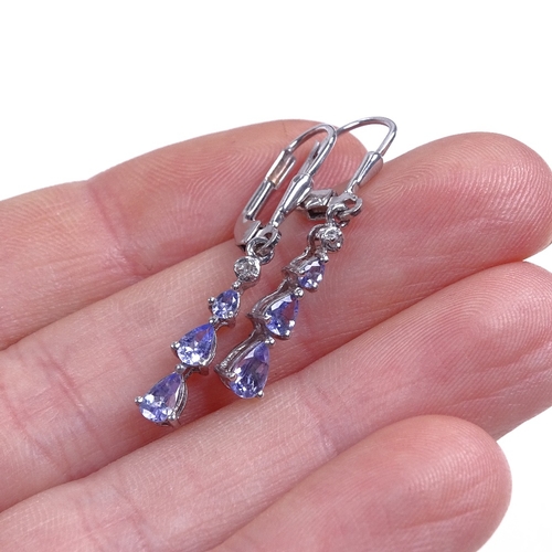 783 - A modern pair of sterling silver pear-cut tanzanite and diamond pendant earrings, earring height exc... 