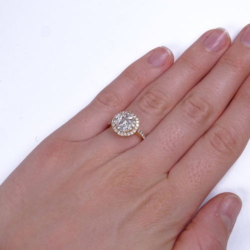 798 - A modern 18ct gold diamond cluster halo ring, set with Princess marquise and round brilliant-cut dia... 