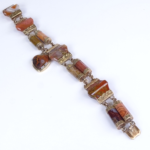 799 - A Victorian Scottish unmarked gold and faceted hardstone panel bracelet, floral engraved mounts enca... 