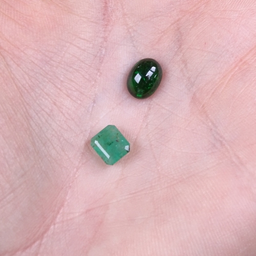 802 - 2 loose emerald gemstones, comprising emerald step-cut (6.33mm x 5.67mm x 2.82mm), and cabochon exam... 