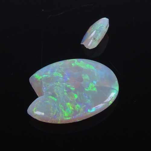 804 - A damaged loose cabochon white opal, dimensions: length - 14.32mm, width - 10.74mm, depth - 3.07mm, ... 